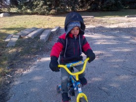 bundled up to ride + run with mom